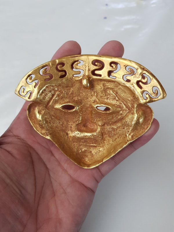Tierradentro Gold Mask Depicting a Human Head 4