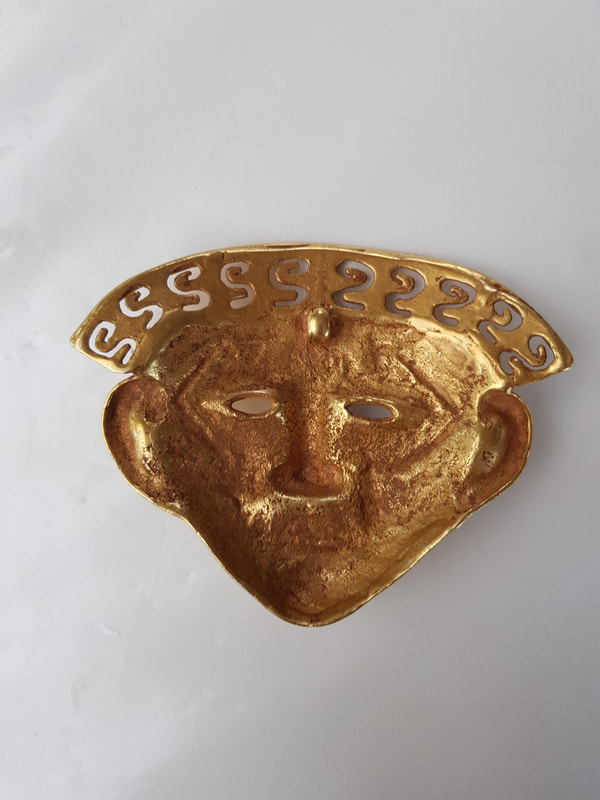 Tierradentro Gold Mask Depicting a Human Head 6