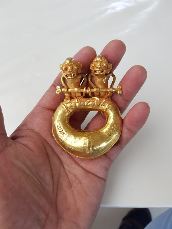 Diquis Gold Pendant Depicting Double-Monkey Figures On Top of a Ring 2
