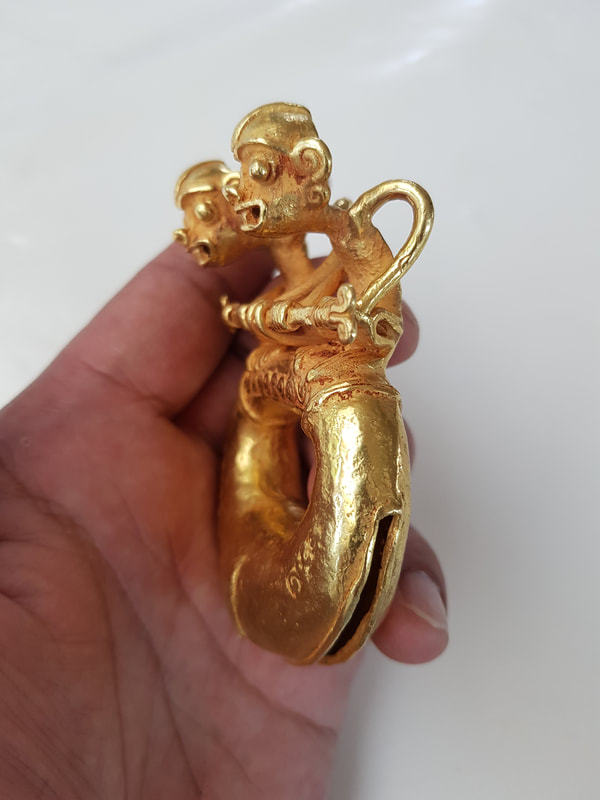 Diquis Gold Pendant Depicting Double-Monkey Figures On Top of a Ring 11