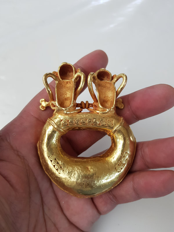 Diquis Gold Pendant Depicting Double-Monkey Figures On Top of a Ring 10