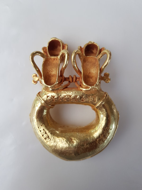 Diquis Gold Pendant Depicting Double-Monkey Figures On Top of a Ring 3