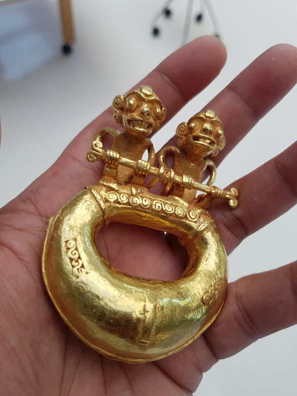 Diquis Gold Pendant Depicting Double-Monkey Figures On Top of a Ring 5