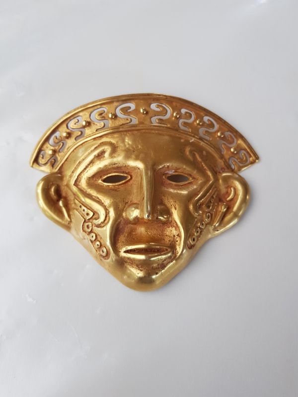 Tierradentro Gold Mask Depicting a Human Head 8
