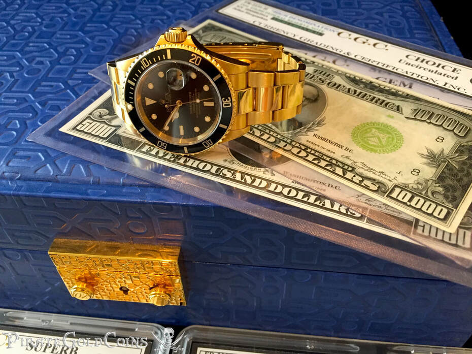 Gold Rolex Submariner w/ Black Face